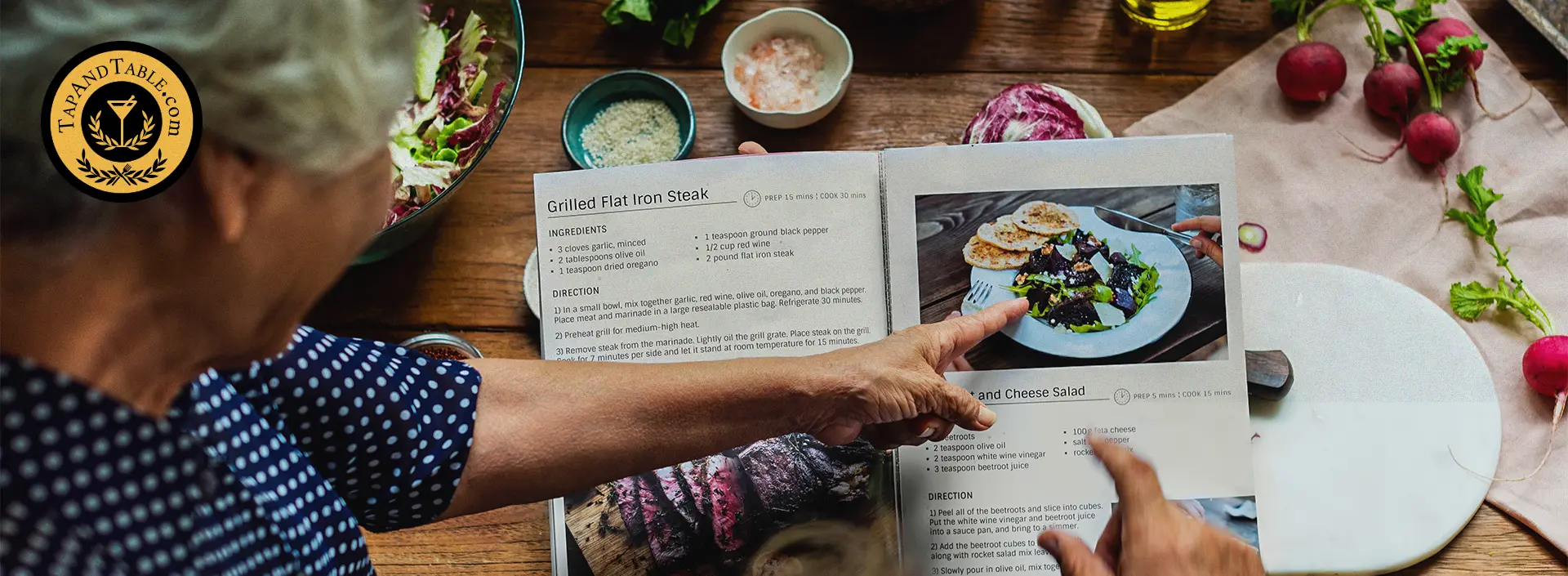 Person reviewing a standardized recipe book while preparing ingredients on a kitchen table
